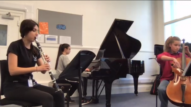 LV (Year 9) student performing for a platform concert via Zoom.