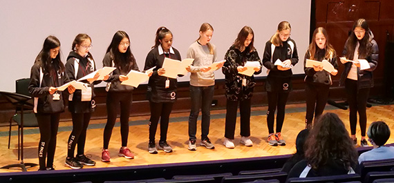 Students performing as part of an Amnesty event.