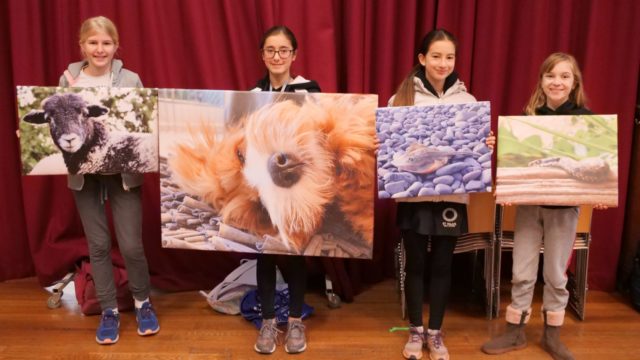 MIV (Year 7) students and their winning artwork.