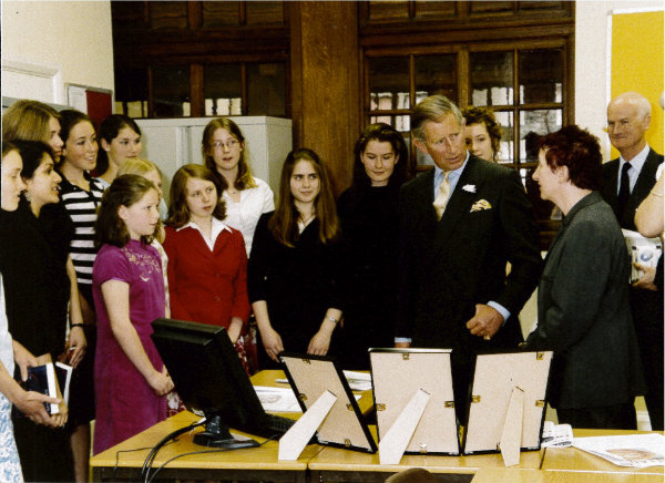 HRH Prince Charles on his visit to the school in 2004.