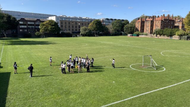 Students playing on the field.