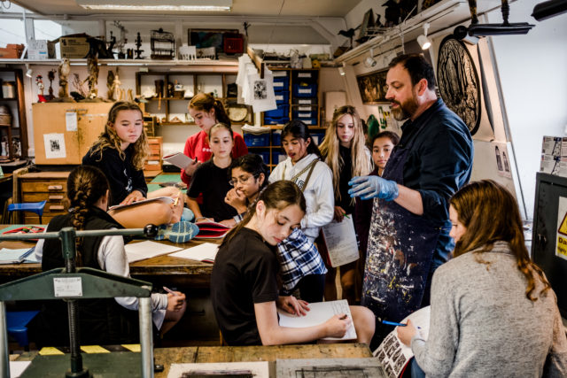 Students in a lesson in the art studio.
