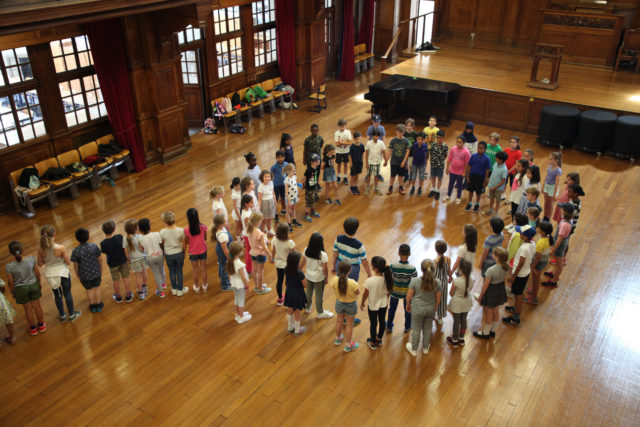 Local primary school students in the Great Hall as part of Summer School.