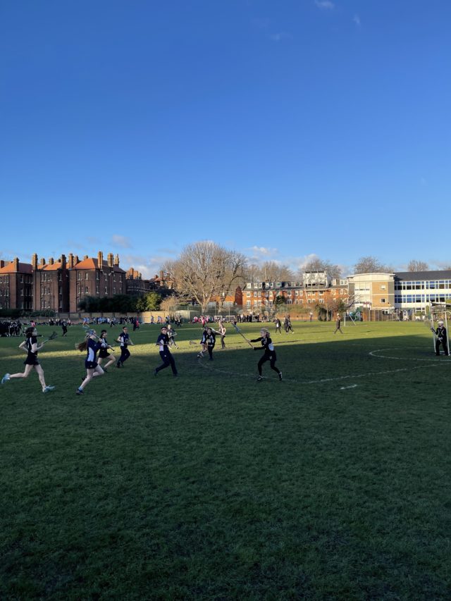 students playing lacrosse