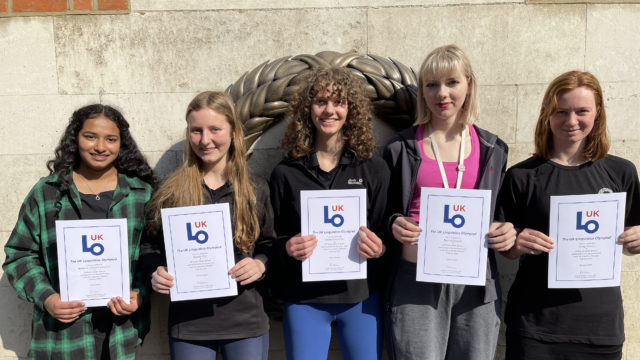 Five students with their UKLO certificates