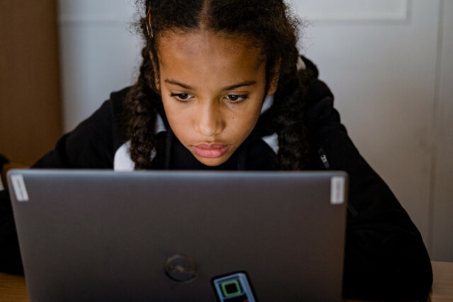 MIV student on a laptop